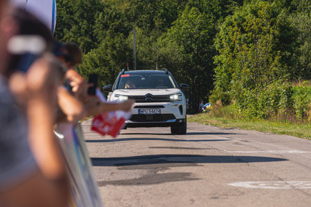 BUDZOW, POLAND - AUGUST 5, 2022: Cycling race "Tour de Pologne" 2022, stage 7 from Skawina to Krakow, professional cyclist riding uphill (KoM in BudzÃ³w)のeditorial素材