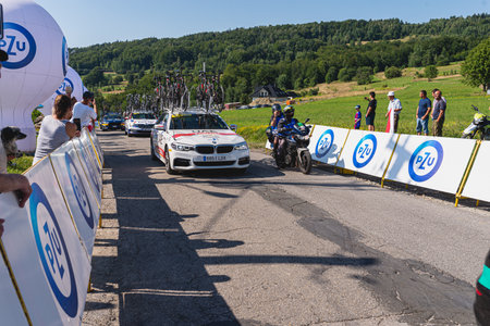 BUDZOW, POLAND - AUGUST 5, 2022: Cycling race "Tour de Pologne" 2022, stage 7 from Skawina to Krakow, professional cyclist riding uphill (KoM in BudzÃ³w)のeditorial素材