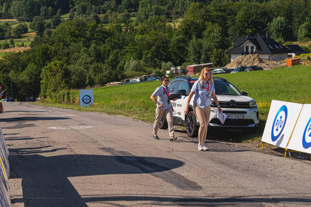 BUDZOW, POLAND - AUGUST 5, 2022: Cycling race "Tour de Pologne" 2022, stage 7 from Skawina to Krakow, professional cyclist riding uphill (KoM in BudzÃ³w)のeditorial素材