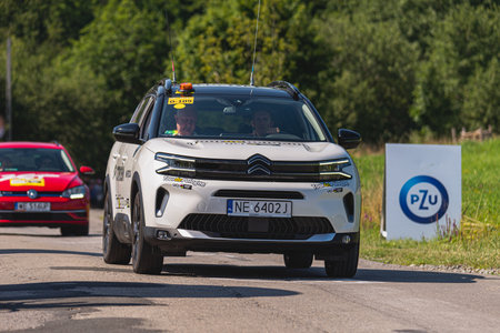 BUDZOW, POLAND - AUGUST 5, 2022: Cycling race "Tour de Pologne" 2022, stage 7 from Skawina to Krakow, professional cyclist riding uphill (KoM in BudzÃ³w)のeditorial素材