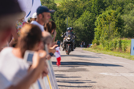 BUDZOW, POLAND - AUGUST 5, 2022: Cycling race "Tour de Pologne" 2022, stage 7 from Skawina to Krakow, professional cyclist riding uphill (KoM in BudzÃ³w)のeditorial素材