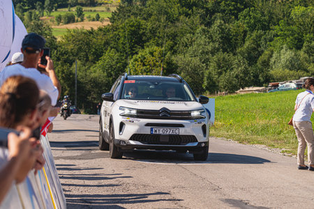 BUDZOW, POLAND - AUGUST 5, 2022: Cycling race "Tour de Pologne" 2022, stage 7 from Skawina to Krakow, professional cyclist riding uphill (KoM in BudzÃ³w)のeditorial素材