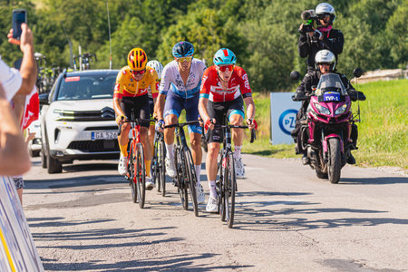 BUDZOW, POLAND - AUGUST 5, 2022: Cycling race "Tour de Pologne" 2022, stage 7 from Skawina to Krakow, professional cyclist riding uphill (KoM in BudzÃ³w)のeditorial素材