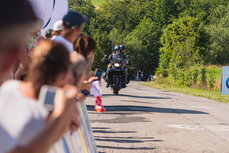 BUDZOW, POLAND - AUGUST 5, 2022: Cycling race "Tour de Pologne" 2022, stage 7 from Skawina to Krakow, professional cyclist riding uphill (KoM in BudzÃ³w)のeditorial素材