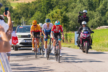 BUDZOW, POLAND - AUGUST 5, 2022: Cycling race "Tour de Pologne" 2022, stage 7 from Skawina to Krakow, professional cyclist riding uphill (KoM in BudzÃ³w)のeditorial素材