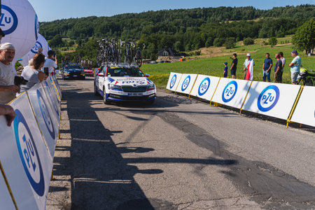 BUDZOW, POLAND - AUGUST 5, 2022: Cycling race "Tour de Pologne" 2022, stage 7 from Skawina to Krakow, professional cyclist riding uphill (KoM in BudzÃ³w)のeditorial素材