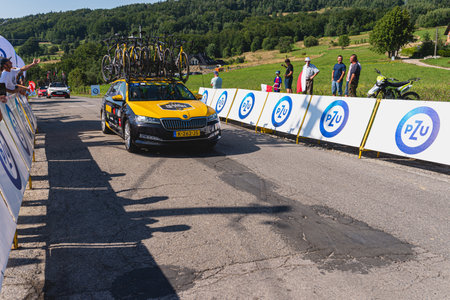 BUDZOW, POLAND - AUGUST 5, 2022: Cycling race "Tour de Pologne" 2022, stage 7 from Skawina to Krakow, professional cyclist riding uphill (KoM in BudzÃ³w)のeditorial素材