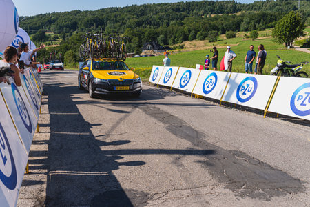 BUDZOW, POLAND - AUGUST 5, 2022: Cycling race "Tour de Pologne" 2022, stage 7 from Skawina to Krakow, professional cyclist riding uphill (KoM in BudzÃ³w)のeditorial素材