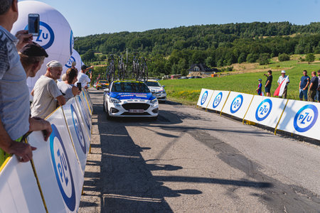 BUDZOW, POLAND - AUGUST 5, 2022: Cycling race "Tour de Pologne" 2022, stage 7 from Skawina to Krakow, professional cyclist riding uphill (KoM in BudzÃ³w)のeditorial素材