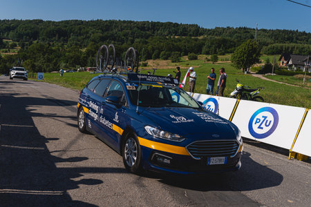 BUDZOW, POLAND - AUGUST 5, 2022: Cycling race "Tour de Pologne" 2022, stage 7 from Skawina to Krakow, professional cyclist riding uphill (KoM in BudzÃ³w)のeditorial素材