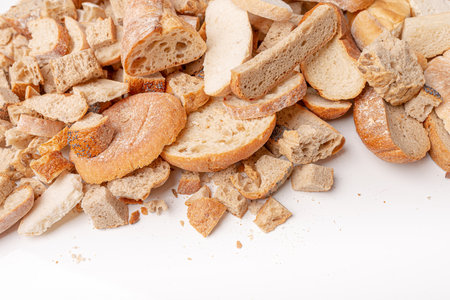 Photo of Slices of old, dry bread. Intended for a breadcrumbs of for the cattle. Dry bread. copyspace.の写真素材