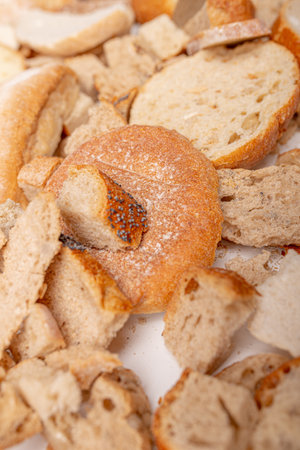 Photo of Slices of old, dry bread. Intended for a breadcrumbs of for the cattle. Dry bread.