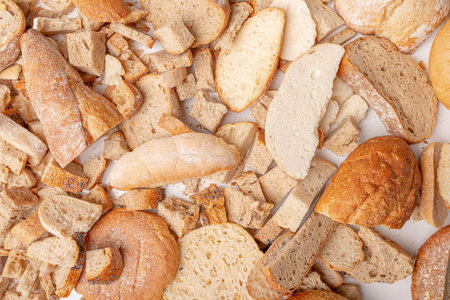 Photo of Slices of old, dry bread. Intended for a breadcrumbs of for the cattle. Dry bread.の写真素材