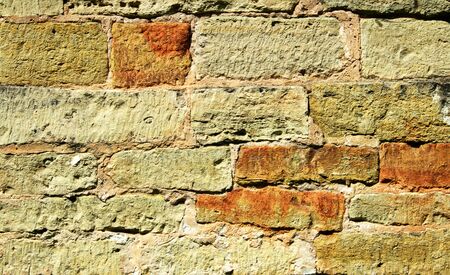 Old stone wall surface closeup for backgroundの写真素材