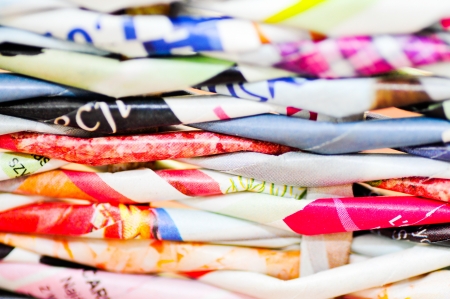 Design of interwoven colored newspapersの写真素材