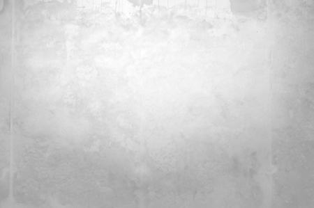 Centrally up illuminated wall or structure of gray paperの写真素材