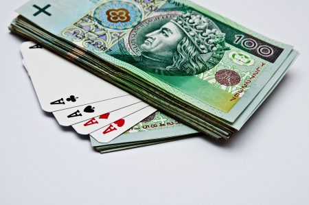 Four of a Kind Poker, and a stack of moneyの写真素材