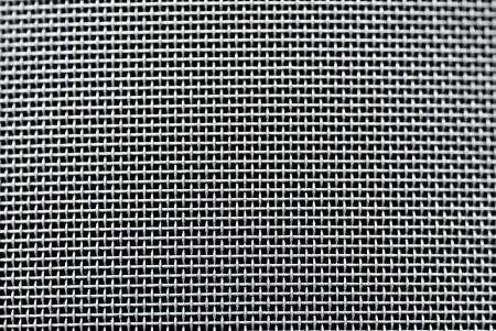 Silver repeatable texture composed of metal wiresの写真素材