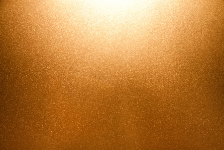 Beautiful gold texture with glow from the topの写真素材