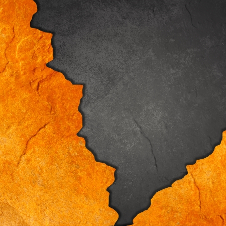 Black and orange material placed rocks as backgroundの写真素材