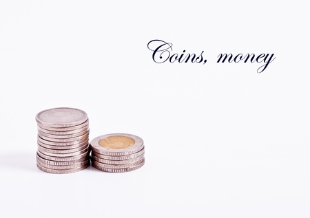 The two denominations of coins arranged in stacksの写真素材