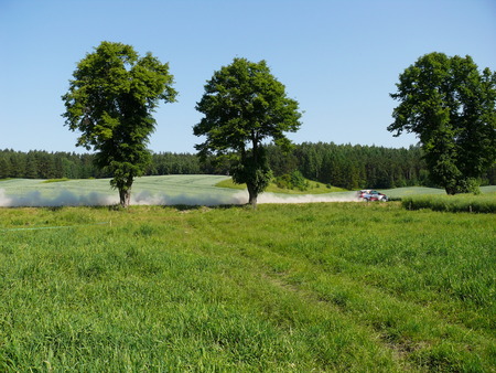 Rally struggles against the background of Masurian landscape.の写真素材