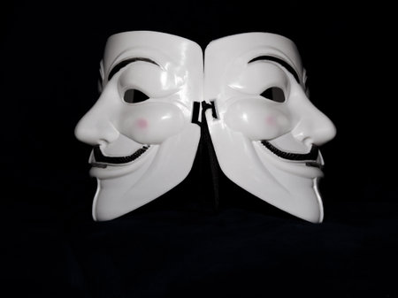 Masks with the theater concept on a black background. Isolated.の写真素材