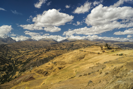 Panoramic view of a sunlit valley in Peruvian Cordillera Negraの写真素材