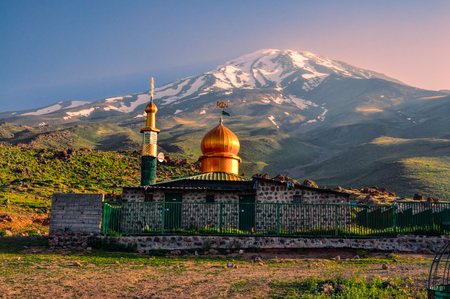 Picturesque mosque underneath volcano Damavand, highest peak in Iranの写真素材