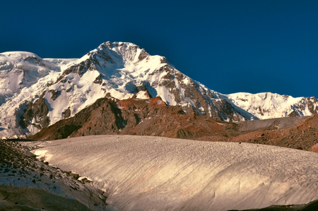 Scenic view of glacier and highest peaks in Tien-Shan mountain range in Kyrgyzstanの写真素材