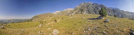Scenic panorama of picturesque mountain range in Kyrgyzstanの写真素材