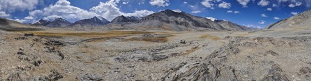 Scenic panorama of cold arid landscape in Tajikistan on sunny dayの写真素材