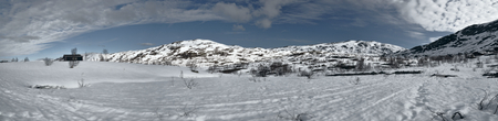 Scenic panorama of snowy landscape near Trolltunga in Norwayの写真素材