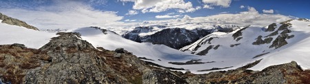 Scenic panorama of snowy landscape near Trolltunga in Norwayの写真素材