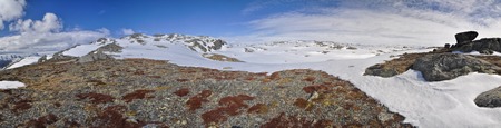 Scenic panorama of snowy landscape near Trolltunga in Norwayの写真素材