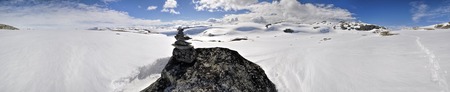 Scenic panorama of snowy landscape near Trolltunga in Norwayの写真素材