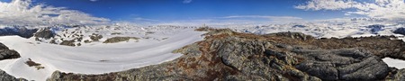 Scenic panorama of snowy landscape near Trolltunga in Norwayの写真素材
