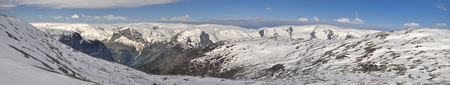 Scenic panorama of snowy landscape near Trolltunga in Norwayの写真素材