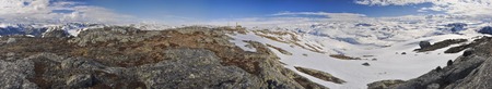 Scenic panorama of snowy landscape near Trolltunga in Norwayの写真素材