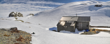 Scenic panorama of snowy landscape near Trolltunga in Norwayの写真素材