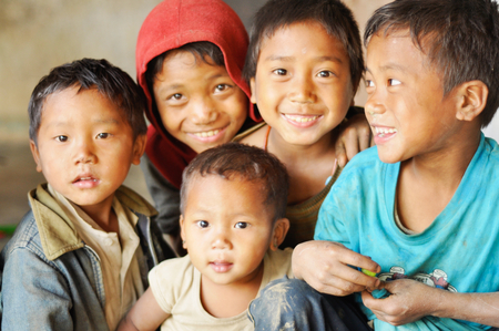 Nagaland, India - March 2012: Group of happy children in Nagaland, remote region of India. Documentary editorial.のeditorial素材