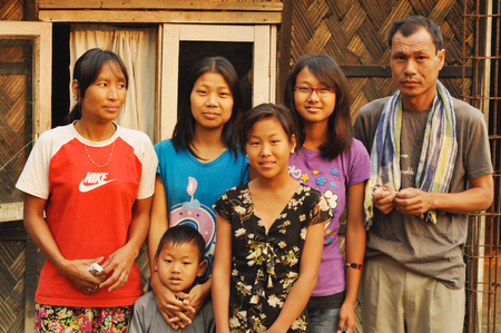 Nagaland, India - March 2012: Portrait of family in Nagaland, remote region of India. Documentary editorial.のeditorial素材
