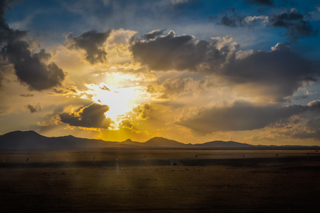 Photo of sunset on cloudy sky in Ala Archa National Park in Kyrgystan.の写真素材