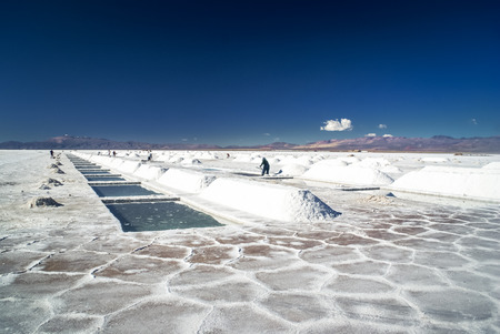Photo of large salt mines Purmamarca Salinas grandes and workers in Salta, city in Argentina.の写真素材