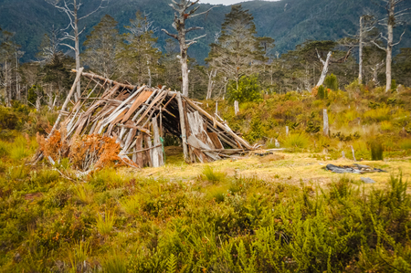 Photo of simple wooden shelter in wilderness in Trikora, Papua, Indonesia. This is very remote location, rarely visited by people.の写真素材