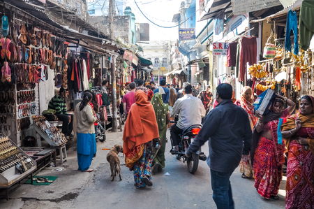 Pushkar, Rajasthan - circa December 2011: Photo of people at marketplace in Pushkar, Rajasthan. Documentary editorial.のeditorial素材