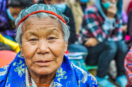 Bohdgaya, Bihar - circa January 2012: Old woman with nice face and grey hair in Bohdgaya, Bihar. Documentary editorial.のeditorial素材
