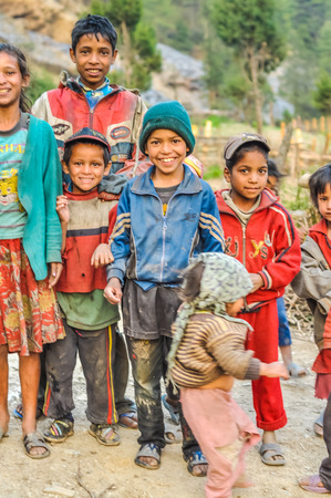 Beni, Nepal - circa May 2012: Photo of group of native children posing and in Beni, Nepal. Documentary editorial.のeditorial素材