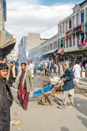Kabul, Afghanistan - circa October 2011: Photo of people shopping at market in Old town, old city part in Kabul. Documentary editorial.のeditorial素材