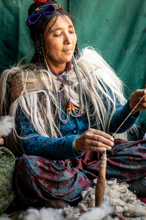 Ladakh, India - August 29, 2018: Portrait of an indigenous woman working in Ladakh, India. Illustrative editorial.のeditorial素材